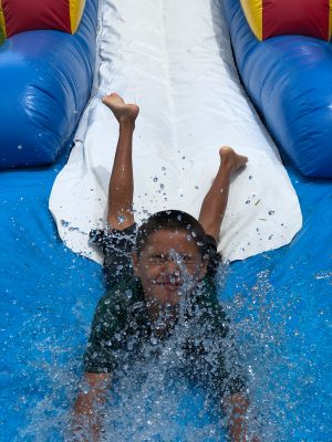 Kid on water slide